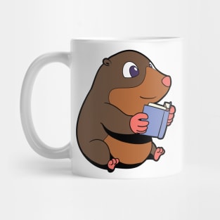 Comic mole reads book Mug